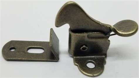 spring steel cabinet door latch|inside cabinet door latch.